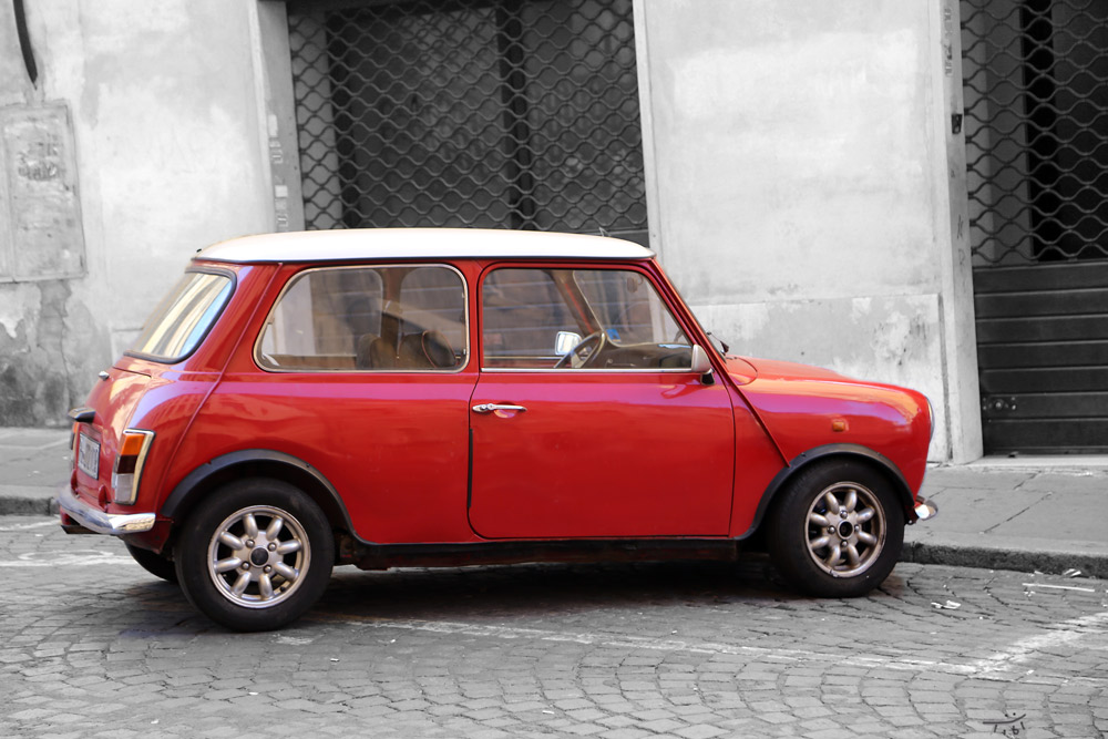 Red Mini in Rome on black and white.